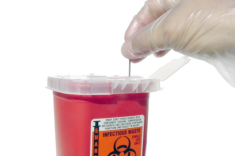 Sealed sharps disposal container